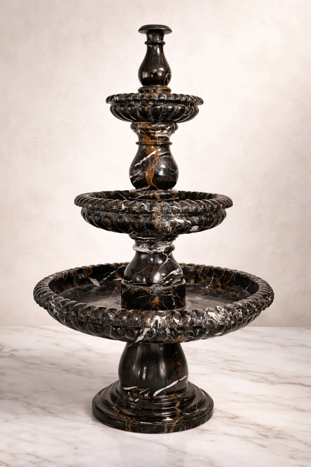 Black marble multi tier water fountain with natural golden veins